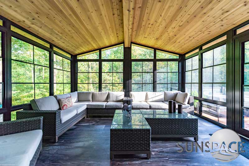 Elegant and cosy Sunspace Sunroom interior by Home Pro, blending indoor comfort with natural outdoor views