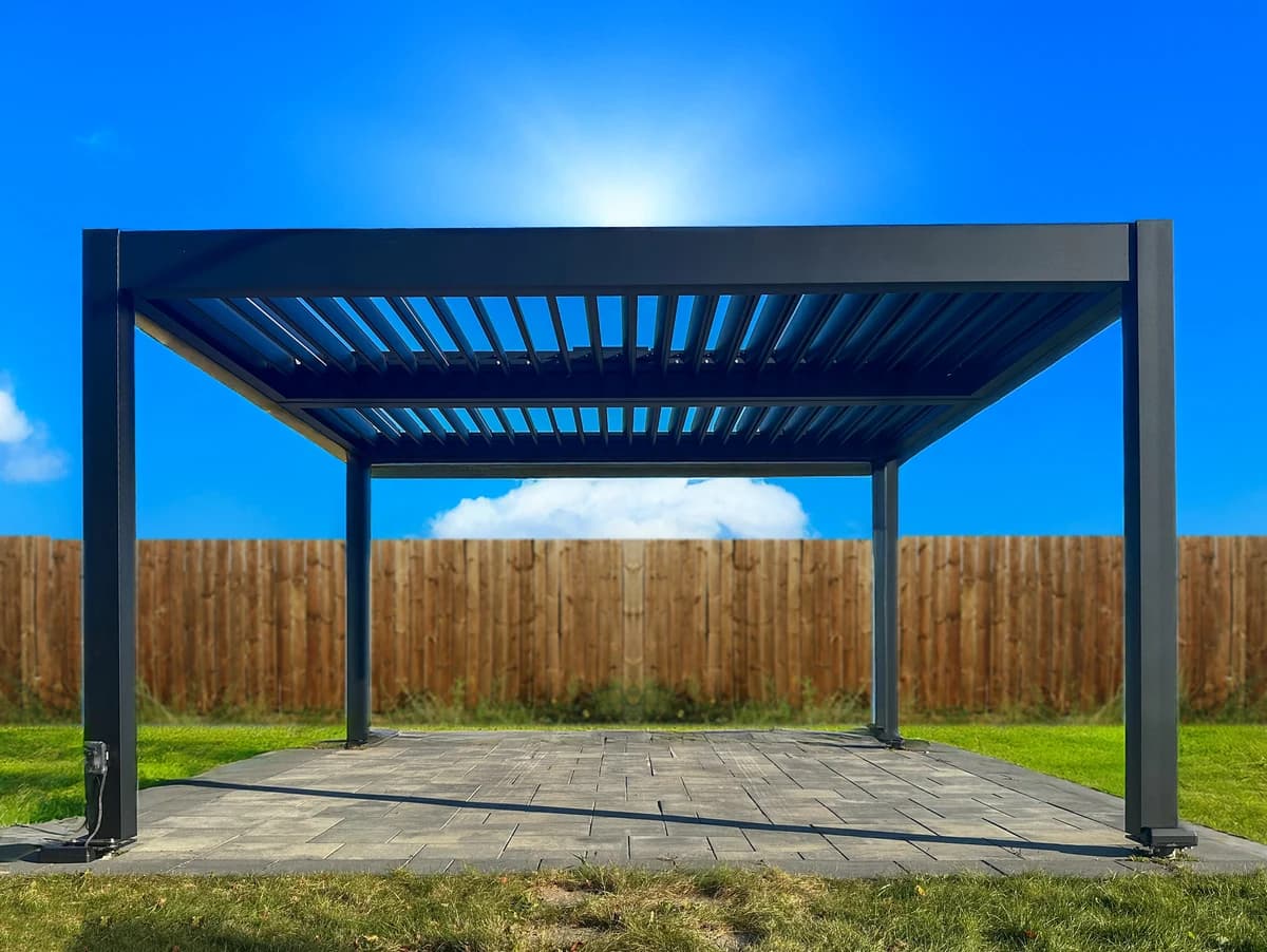 Residential pergola creating shade beside a pool or spa area